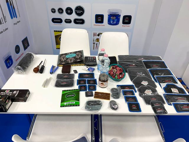 Repair products on the table at the Blackstone Rubber stand, Autopromotec Bologna 2022