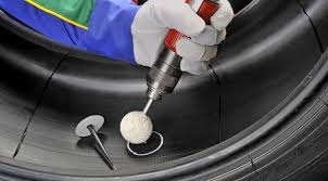 A patch plug going in from inside the tyre